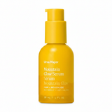 Ursa Major Mountain Glow Serum yellow pump bottle close-up on white background