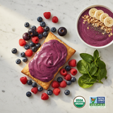 Organic wildberry acai pastry flat lay with fresh berries on white marble