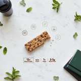 IQBAR protein bar flat lay showing 12G protein 1G sugar keto vegan claims